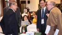 David Ho (left), MD, Chengdu Xu, MD, and Henry Ginsberg (right), MD, at the 2019 symposium.